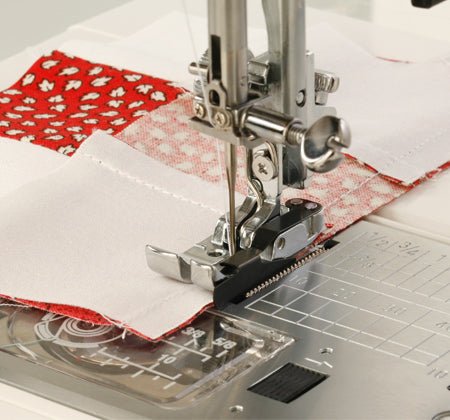 Janome 1/4" Seam Foot: Top Load, 5 - 7mm Stitch Width Models - Maple Leaf Quilting Company Ltd.
